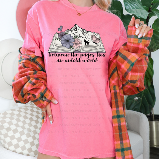 Between The Pages Lies An Untold World Shirt